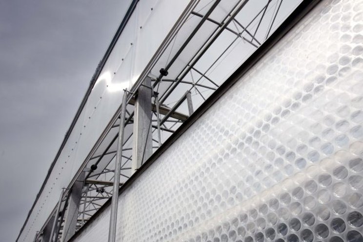 More PAR light by using 'smart' materials in greenhouse